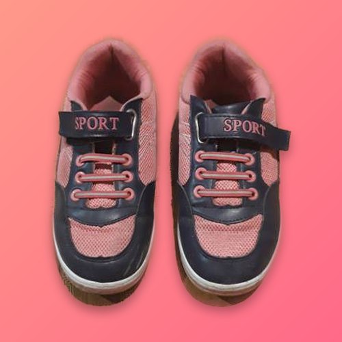 Pink sneakers on a coral gradient background